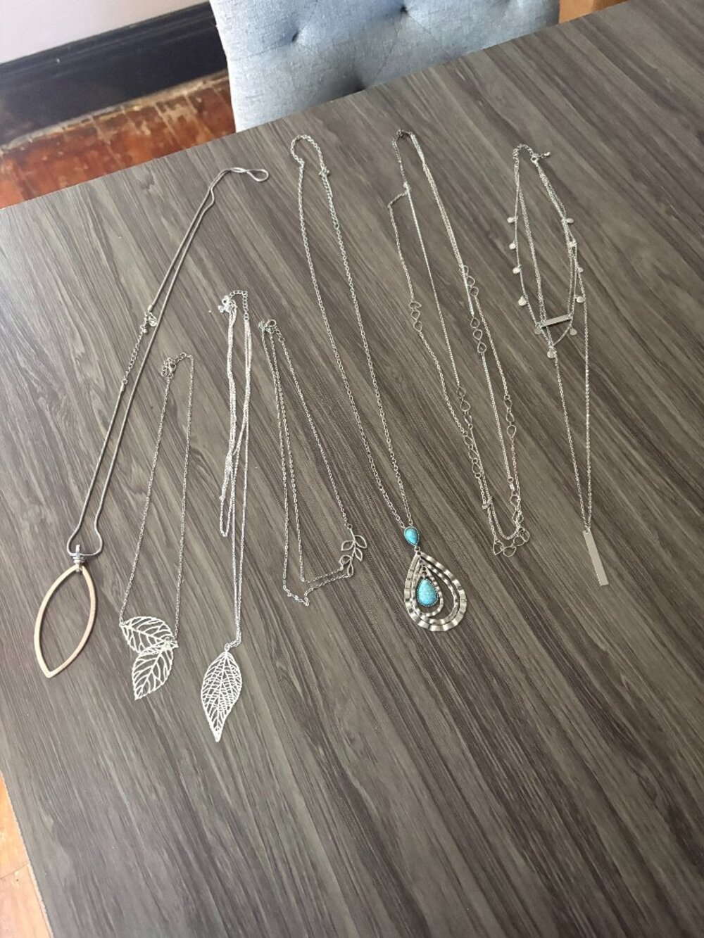Lot of 7 silver tone pendant necklaces